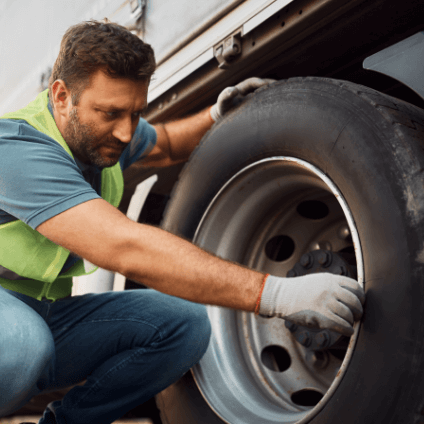 mechanic fixing tire