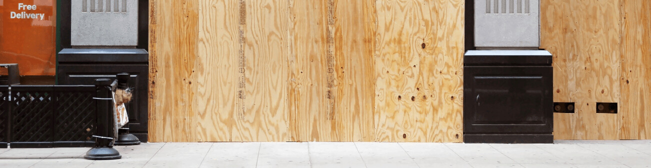 boarded up storefront