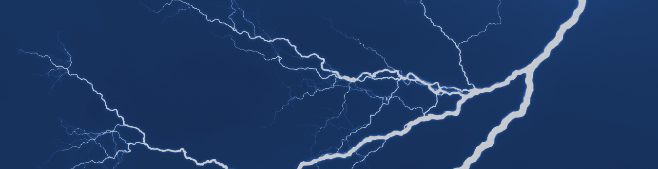 branching lightning in dark blue sky