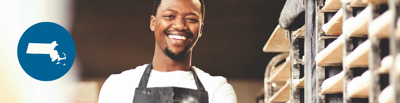 Baker in front of a rack