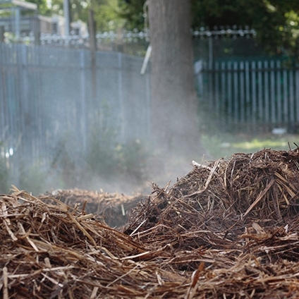 smoldering pile of mulch