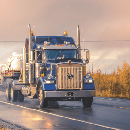 Tractor trailer driving in rural area